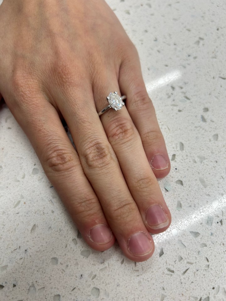 Trying on a Lily Arkwright Lulu 1.2 carat oval silver ring